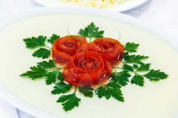 Bowl of galantine with rose and parsley