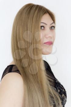 Attractive young girl with long brown healthy straight hair