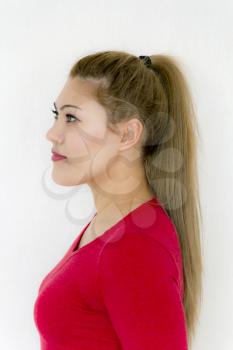 Ponytail Hairstyle. Beauty Fashion Model Girl with Long Healthy Straight Brown Hair. Beautiful Woman with brown long Healthy Smooth Straight hair