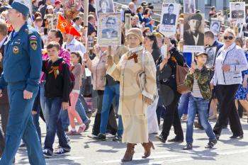 Samara, Russia - May 9, 2016: Procession of the people in Immortal Regiment on annual Victory Day