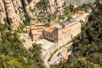 Santa Maria de Montserrat Abbey in Monistrol de Montserrat. View from cableway.