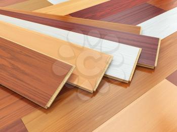 Parquet o laminate wooden planks of the different colors on the floor. 3d illustration