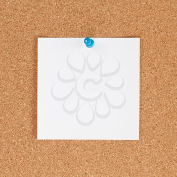 Blank white note paper on cork board square format