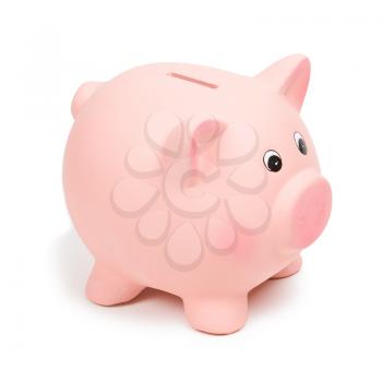 Pink ceramic piggy bank, isolated on white. 