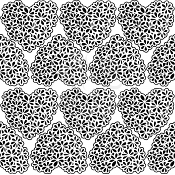 Seamless texture with white and black flower filled hearts.