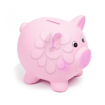 Pink ceramic piggy bank, isolated on white background. Keeping money in a safe or a bank, or in a piggy bank, economy, financials investments, savings for buying a house, a car, for retirement concept