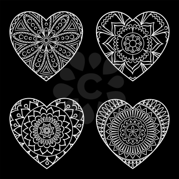 Doodle hearts set. Outline floral design elements in a heart shape. Coloring book pattern. Decorative hearts on black. Love, acceptance, positive energy concept. Vector illustration.