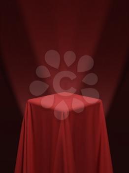 Red fabric covering a cube or a table, with red background and stage spotlights. Can be used as a stand for product display, draped table. Vector illustraion