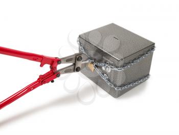 Cutting chain on safe with bolt cutters. Robbery concept.