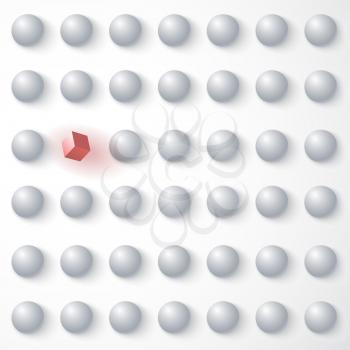 Red cube among white spheres, standing out in the crowd