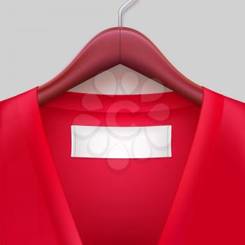 T-shirt with label hanging on a hanger. The template for your design or advertising messages.