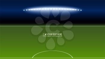 Green soccer field from the goalkeeper area with the spotlights with copy-space for your text or message. Lighted football field, horizontal image with aspect HD video.