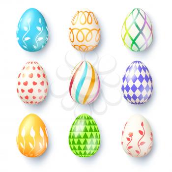 Happy Easter seasons holidays. Collection of handmade Easter eggs with different paintings. Set of Easter eggs isolated on white background. Realistic icons for spring holidays