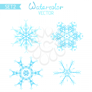 Four various hand-painted snowflakes isolated on white background.