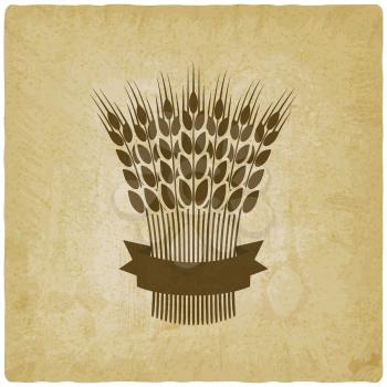sheaf of wheat with ribbon vintage background. vector illustration - eps 10