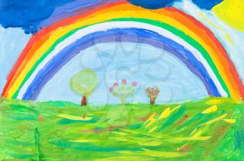 childs painting - rainbow in blue sky under green earth