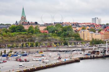 view on shipping terminal and old Sofia Church in Stockholm, Sweden
