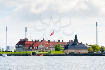 view on old building and danish flag in Copenhagen, Denmark
