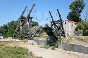 drawbridge (Van Gogh bridge) through canal near Arles, France