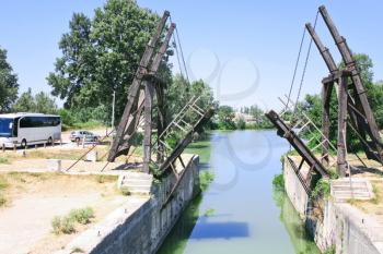 drawbridge (Van Gogh bridge) through canal near Arles, France