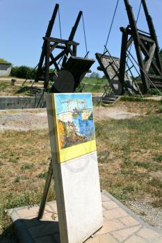 copy of Van Gogh picture and copy Langlois Bridge - drawbridge through canal near Arles, France