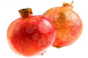 two pomegranates isolated on white