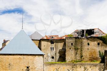 SEDAN, FRANCE - JUNE 30: medieval buildings of Sedan castle, France on June 30, 2010. Construction of fortress started in 1424 and the castle were constantly improved over the ages