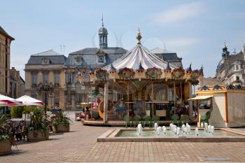 Traditional merry-go-round on town square, France