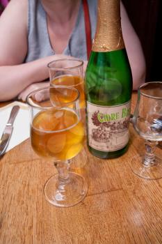 glass of Normandy cider in restaurant