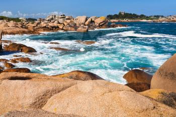 stone Pink Granite Coast in Brittany in sunny day, France