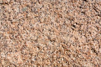 natural pink granite textured surface close up