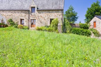 green grass lawn on backyard of old breton estate, France