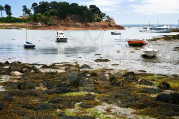 boat mooring during low tide in Ile de Brehat, Brittany, France