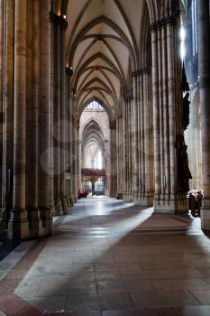 COLOGNE, GERMANY - JUNE 27: aisle of cathedral in Cologne, Germany on June 27, 2010. The Cathedral is Germany's most visited landmark, attracting an average of 20000 people a day