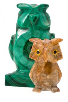 two stone owls - symbol of wisdom, isolated on white