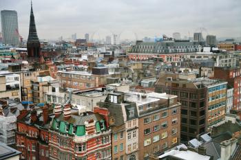 view on London houses and roofs in winter cloudy day