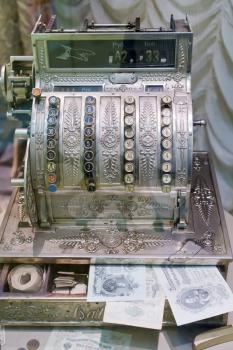 old cash register with old banknotes