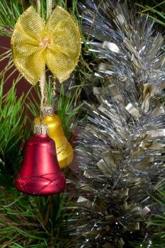 glass bels and tinsel on Christmas-tree