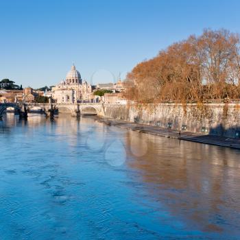 autumn view on Tiber river and St Peter Basilica in Rome