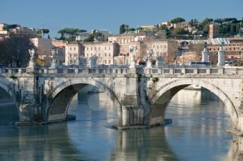 on old town (Rome) through St Angel bridge on Tiber