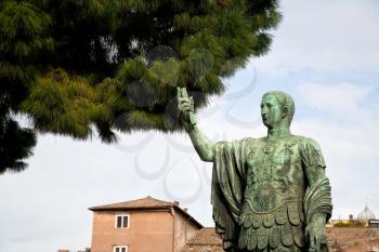 bronze statue of Augustus Ceasar, ancient Roman emperor on Fori Imperiali on Capitoline Hill in Rome, Italy
