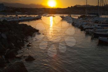 sunset in port of Giardini Naxos - seaside town in Sicily
