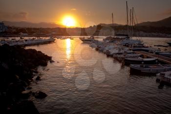 sunset in port of Giardini Naxos - seaside town in Sicily