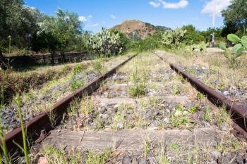 abandoned country railroad in summer day