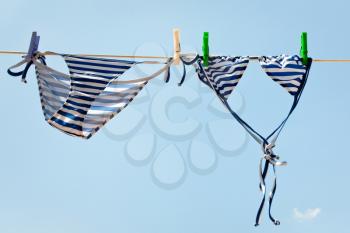 drying woman bikini outdoor in summer day