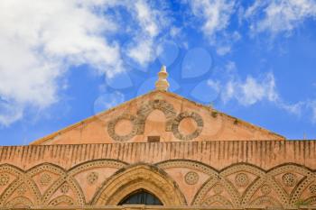 decorated frieze of ancient medieval Norman cathedral -  Duomo di Monreale, Sicily, Italy