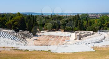 view on antique Greek Theater and Ionian Sea in Syracuse, Italy