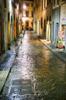 medieval street in Florence Italy at night
