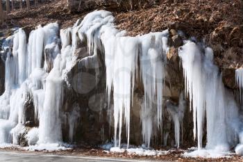 icicles on side of mountain road