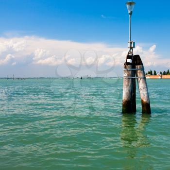 boat traffic pole in Venetian Lagoon, Italy